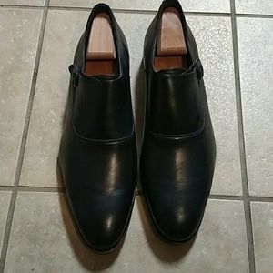 Black single monk strap with black metal toe trim