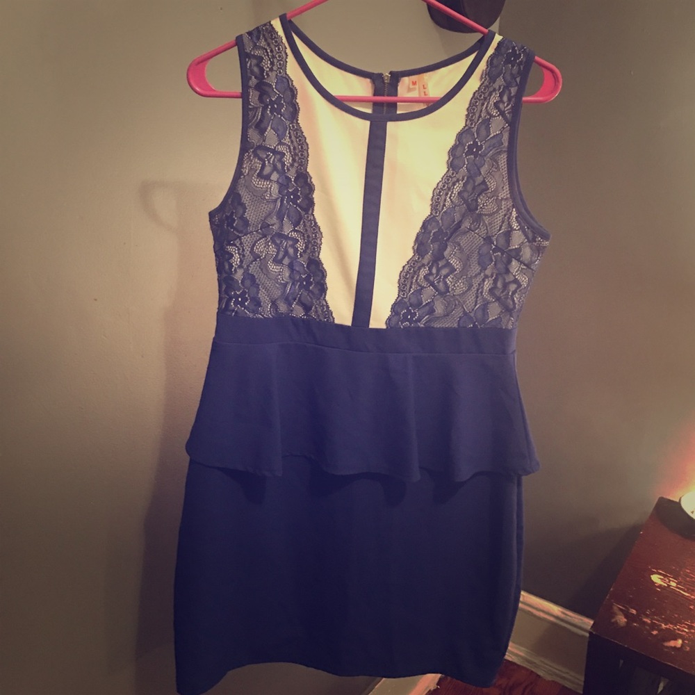 Blue and white cocktail dress with lace detailing