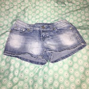 Low rise, light washed jean shorts.