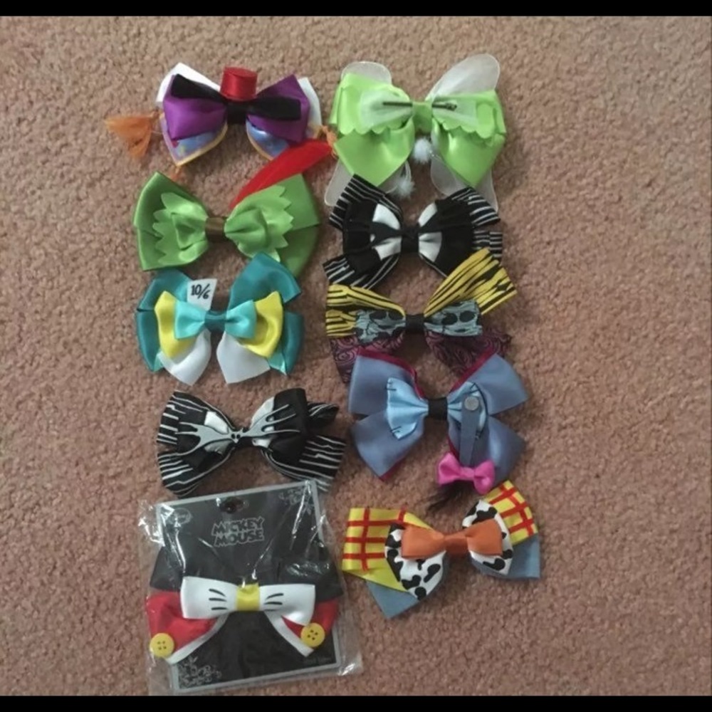 Holding Mickey, Tinkerbell, Woody, Aladdin