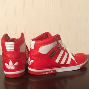 Adidas red and white high tops