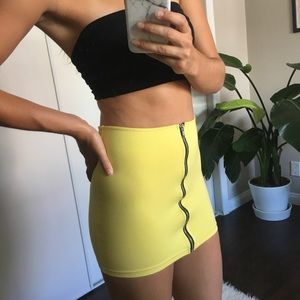 Yellow zip up mini skirt