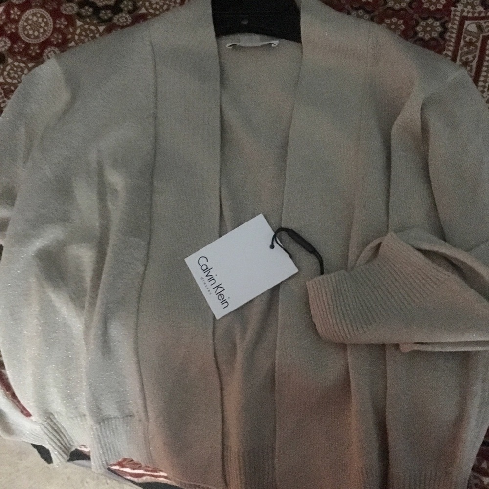 Brand new authentic Calvin Klein gold top