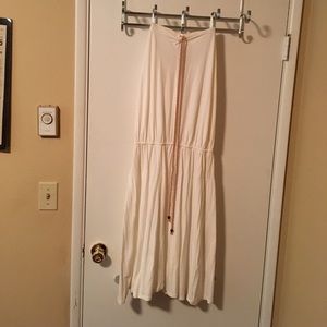 Ella moss white dress with a tan rope neck tie.