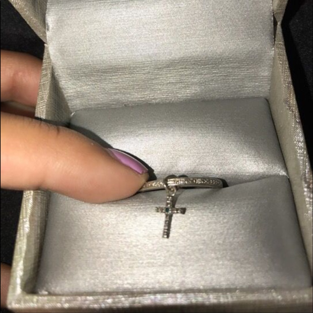 Cross with blue diamond