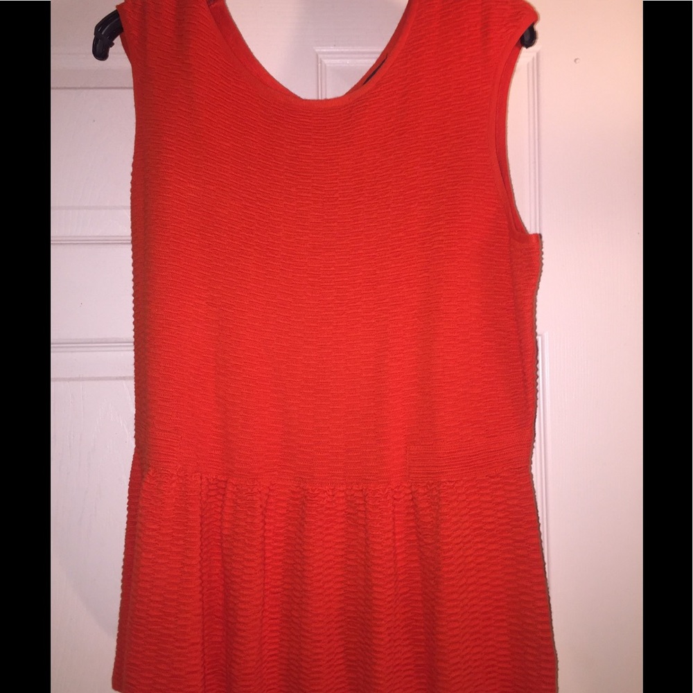 Sleeveless peplum top.. NWOT