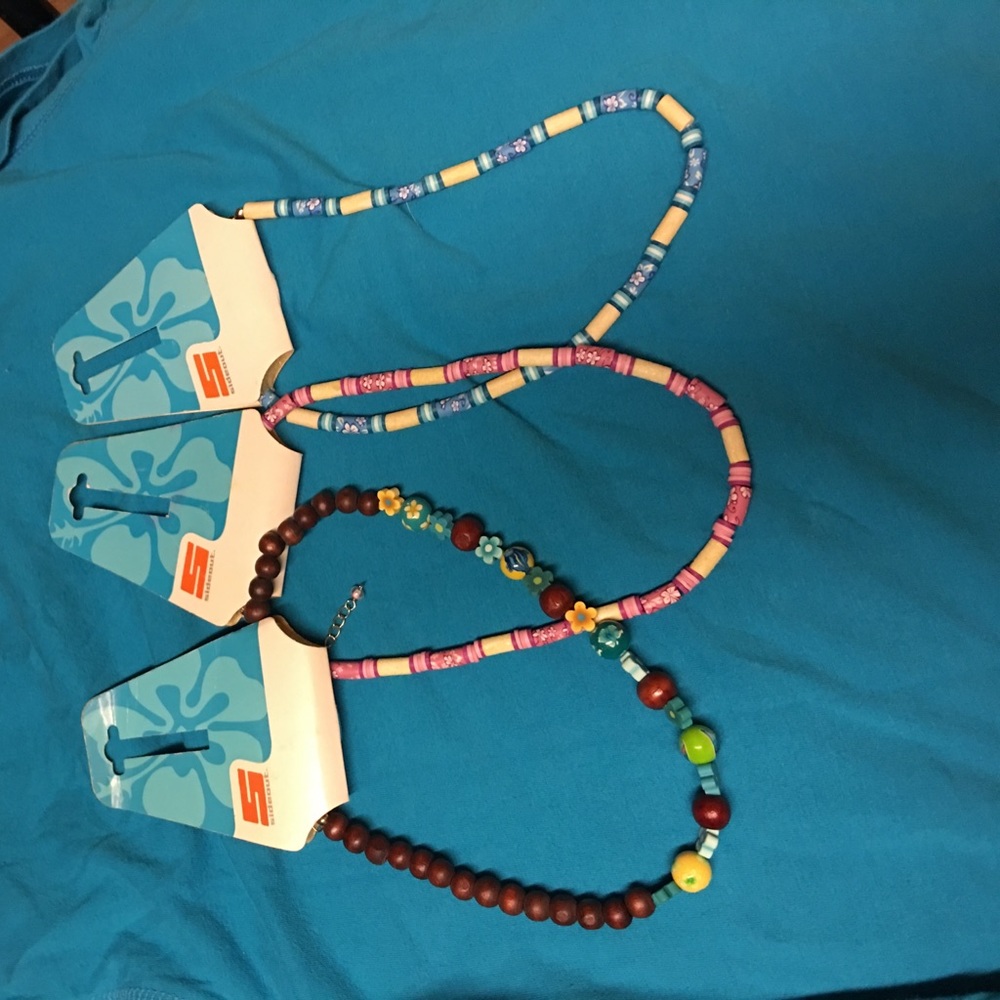 3 necklaces from Hawaii free with any purchase