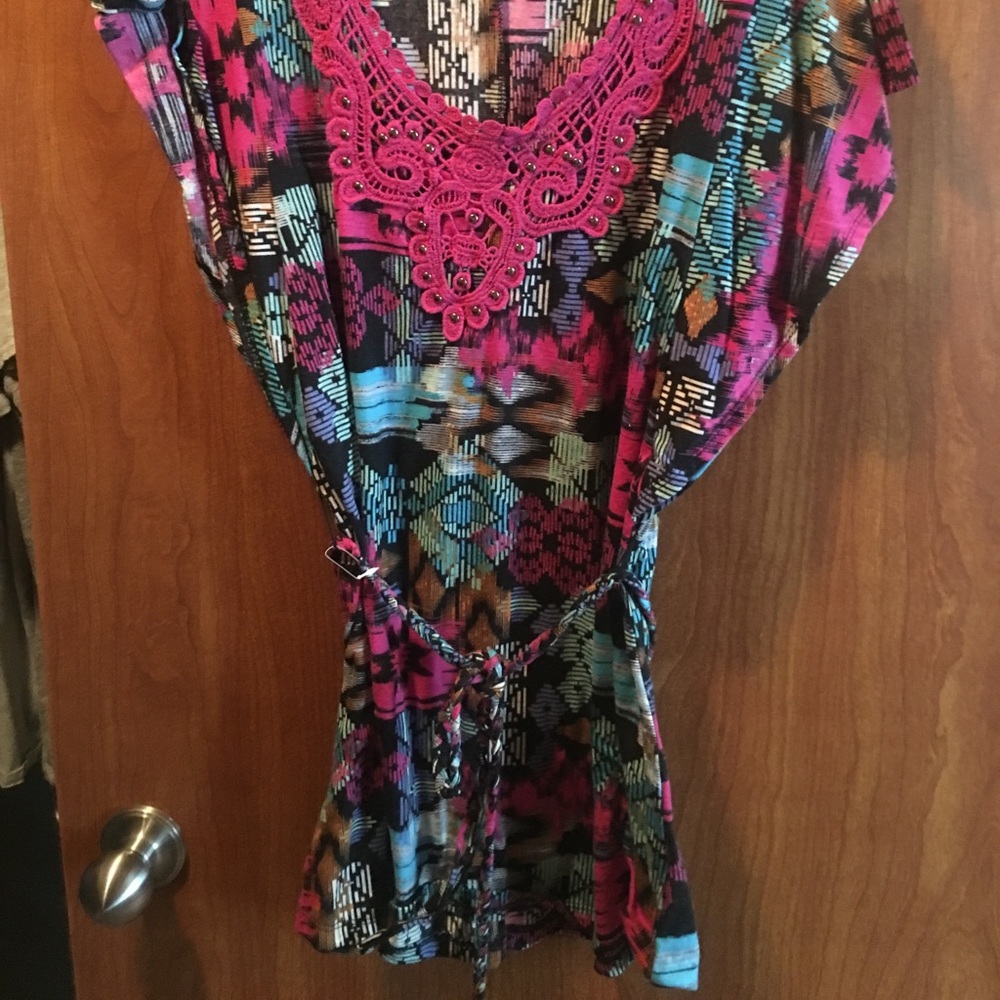 Multicolored Aztec print top.