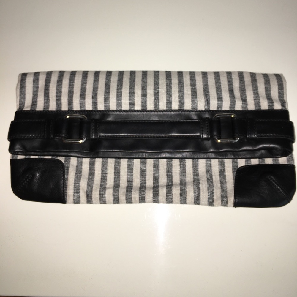 Black/white striped linen clutch with leather trim