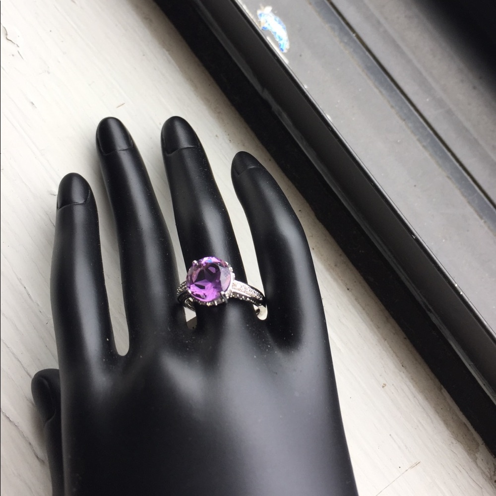 10mm genuine amethyst set in silver.