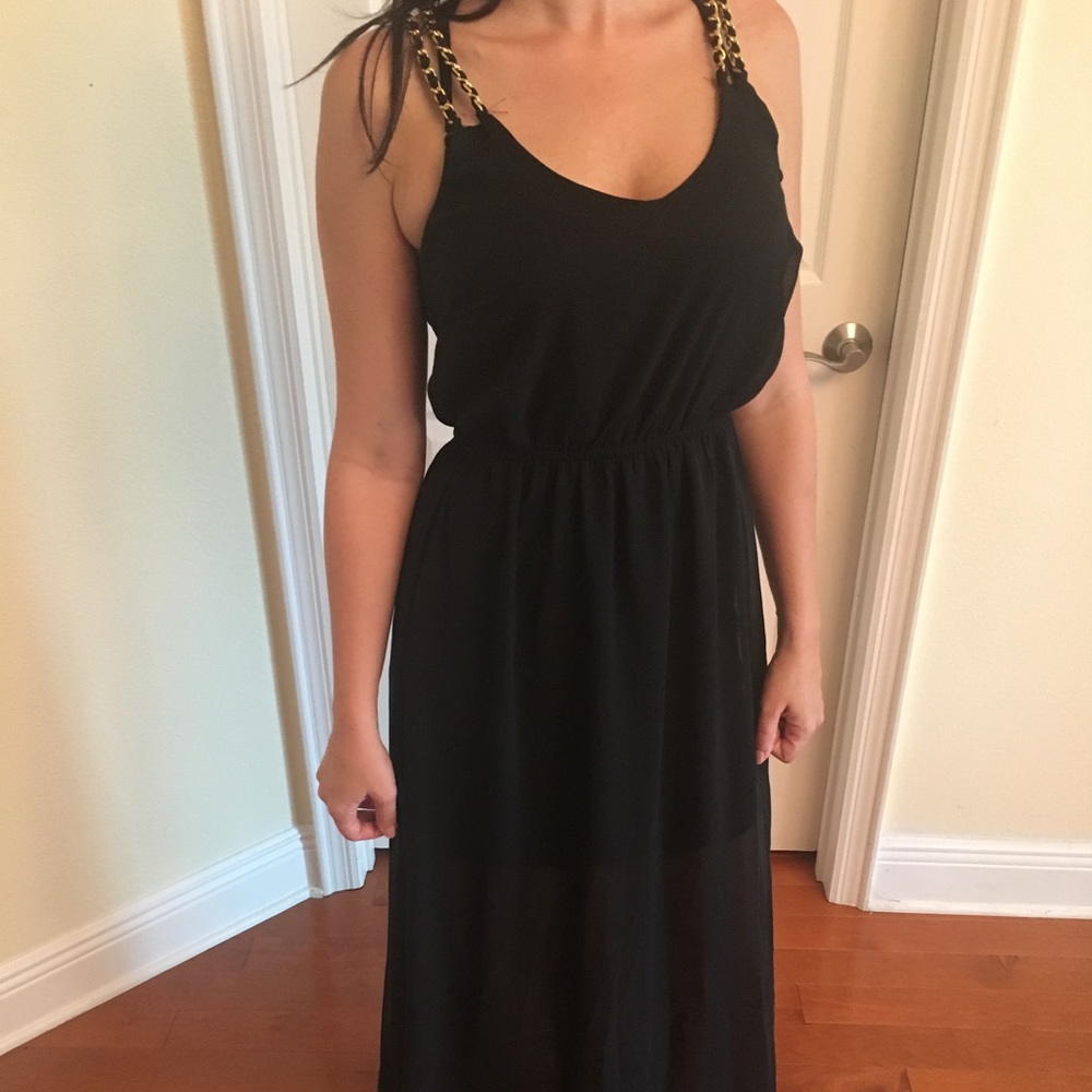 Sheer black dress with gold straps