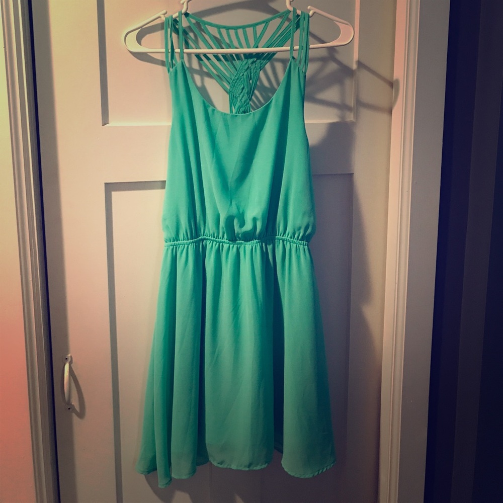 Green dress made by MINE. Size S. Worn 2 times.