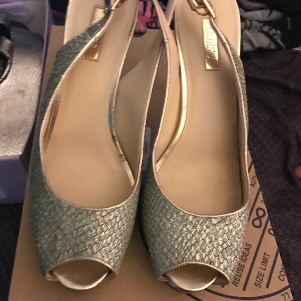 Guess light blue silver heals (snake skin design)