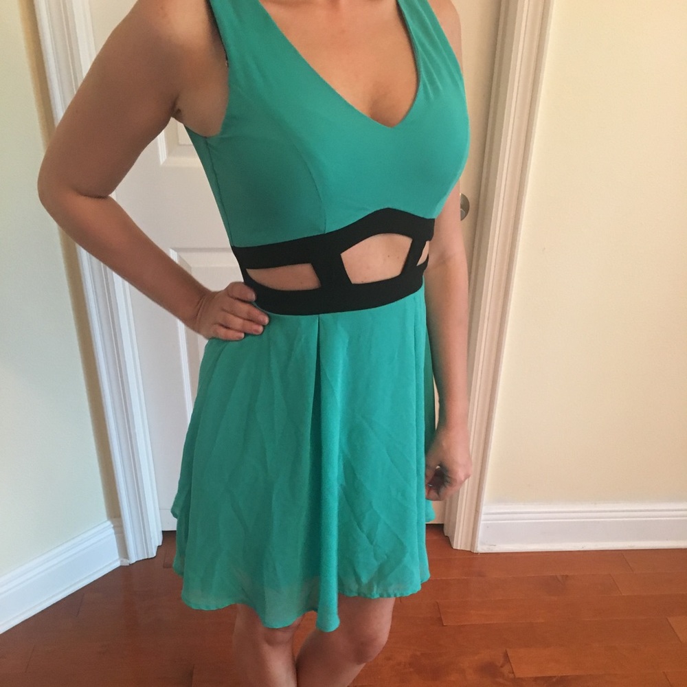 Teal and black cut out dress