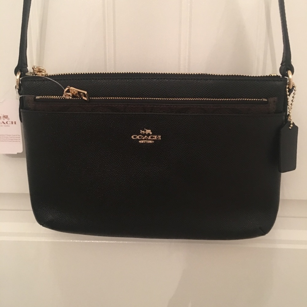 COACH CROSS BODY PURSE Brand New With Tags.