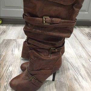 Brown slouch boots.