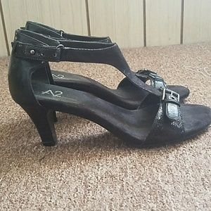 Black 2"heels. Faux snake details. 7 1/2 .wornonce