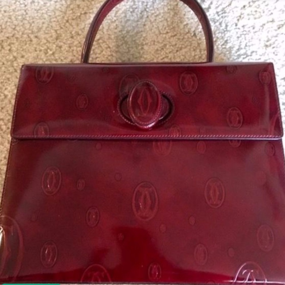 New with card 100% authentic Cartier Purse