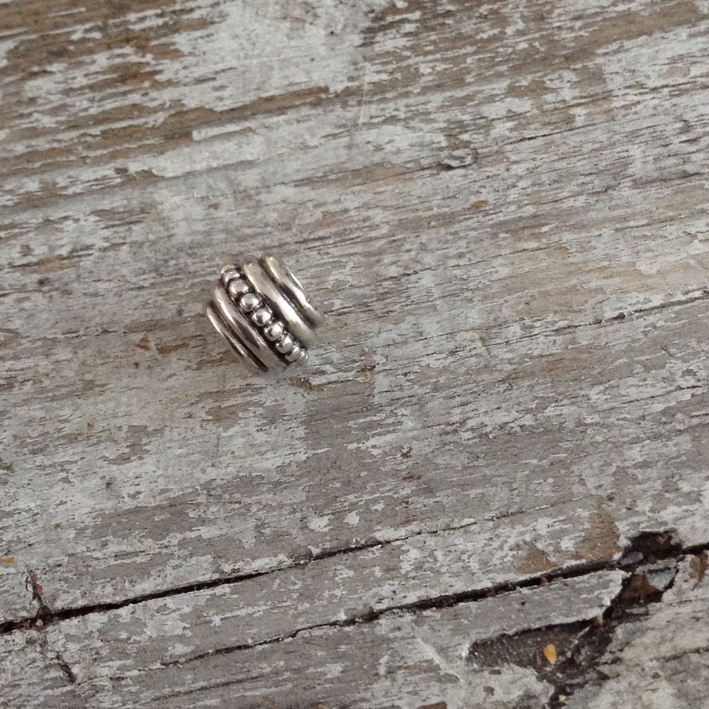 Authentic Pandora silver bead.