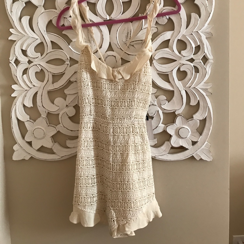Cream backless romper!