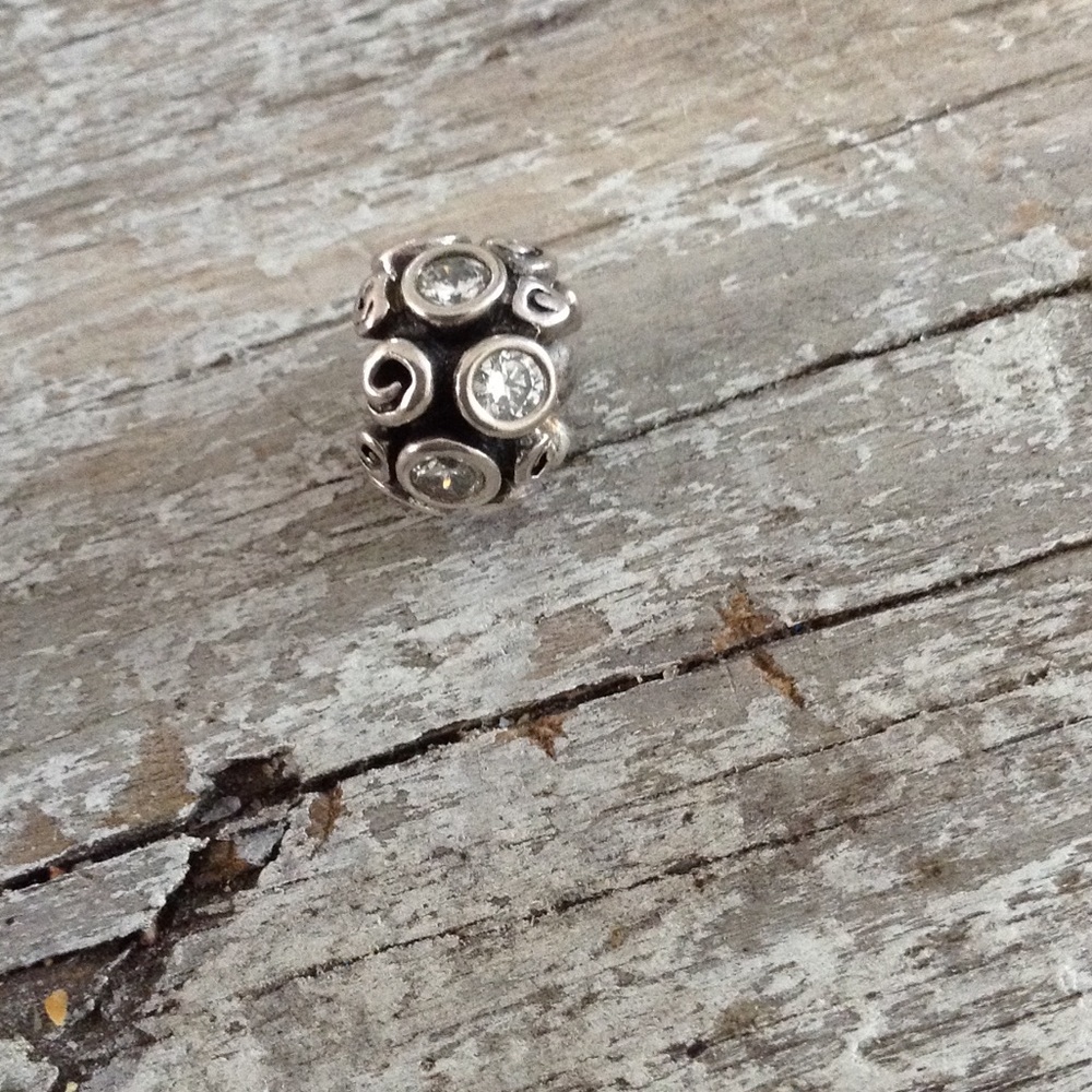 Authentic Pandora silver Cz bead.