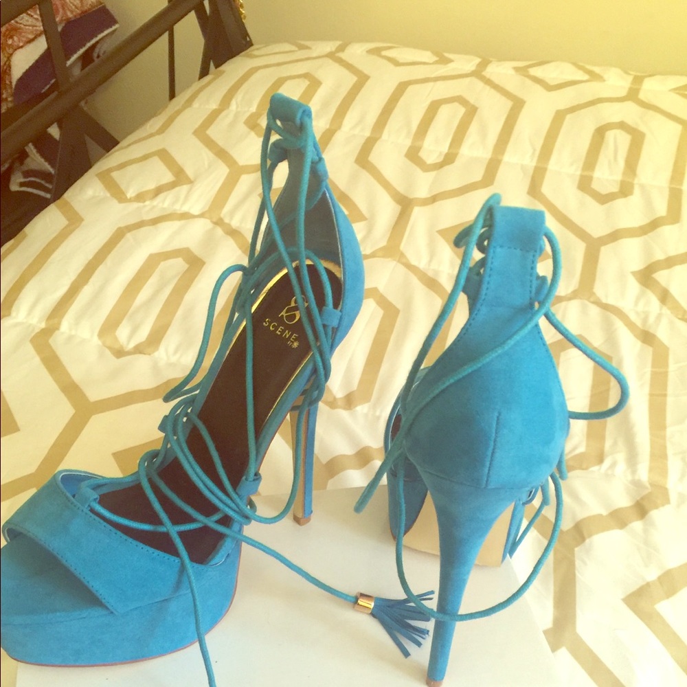 Turquoise lace up the leg stilettos
