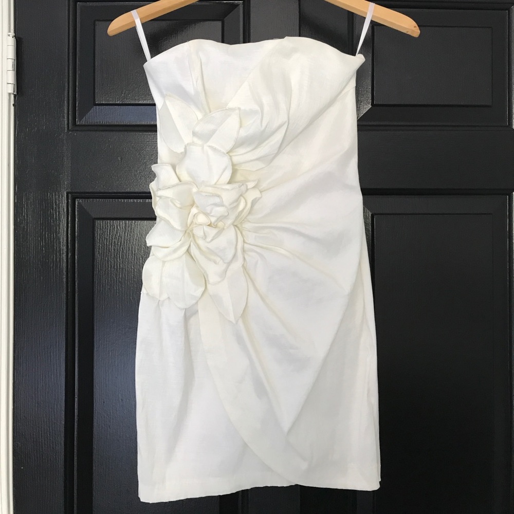 White cocktail dress with floral appliqué