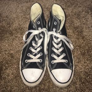 Black high top converse sneakers