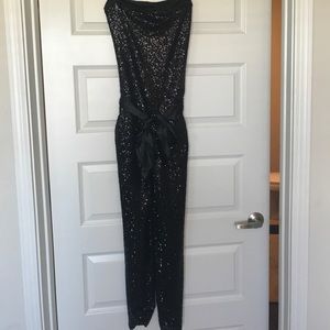 BEBE black sequence romper.