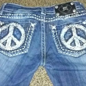 Miss Me Peace sign skinny jeans