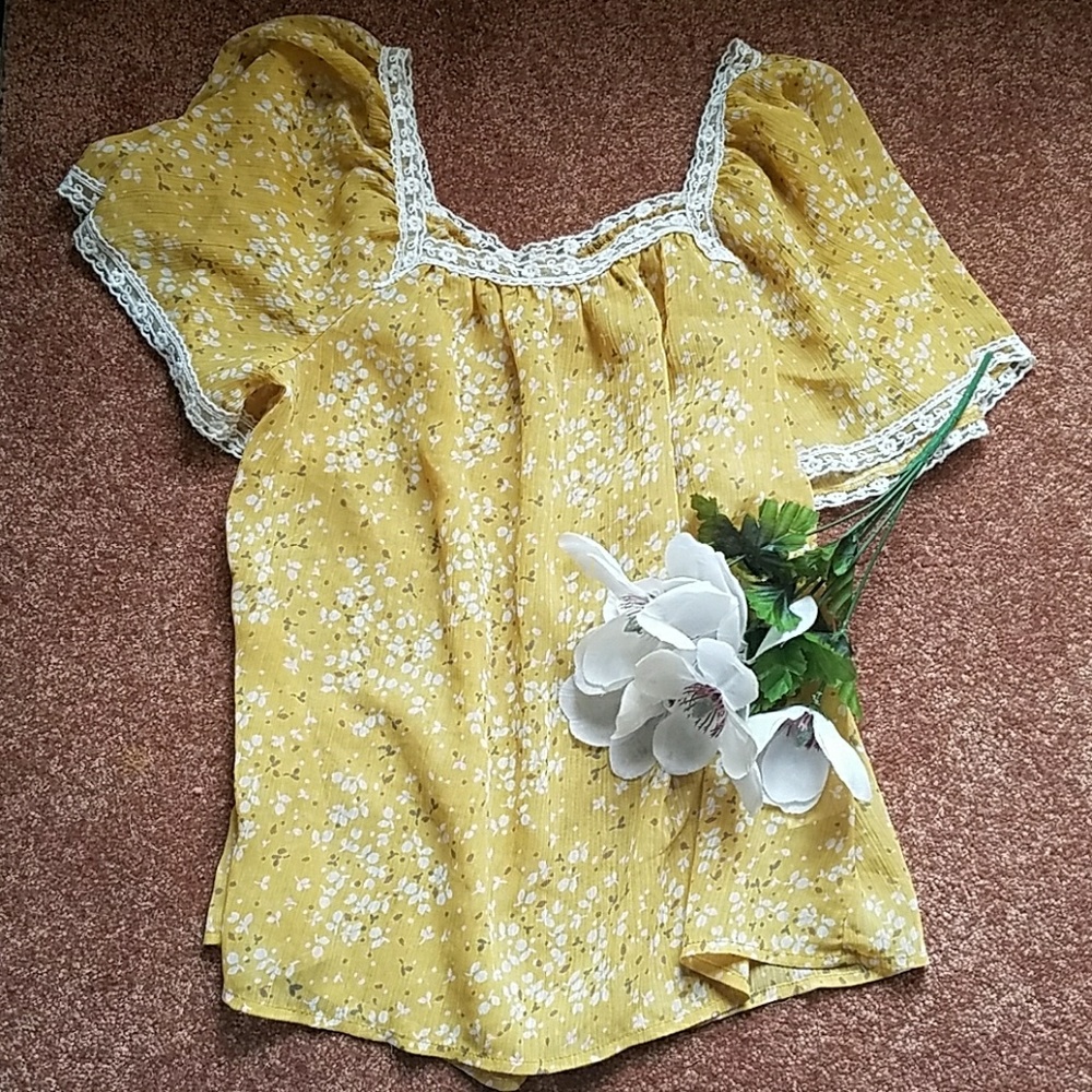 Sheer floral swing top