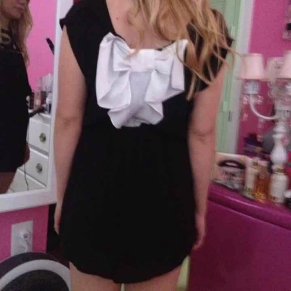 Small black bow back romper