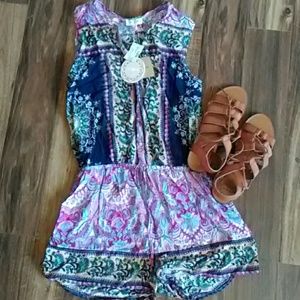 Romper sz large.. (Umgee)..fits m/l