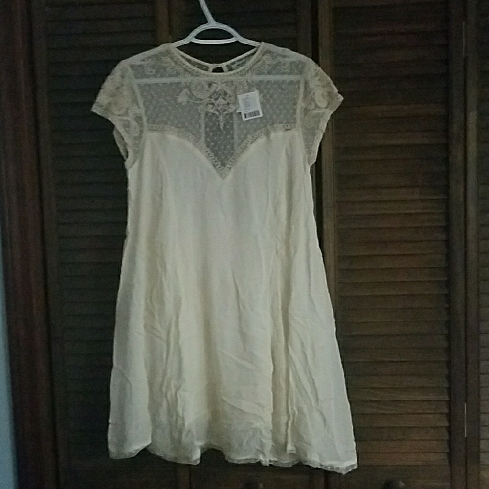 L cream colored dress