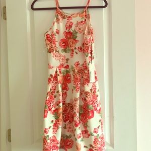 white high neck line skater dress with red flowers