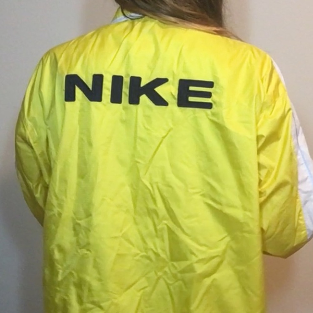 neon yellow Nike windbreaker