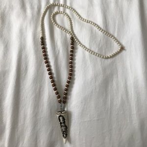 Brown and white beaded horn necklace