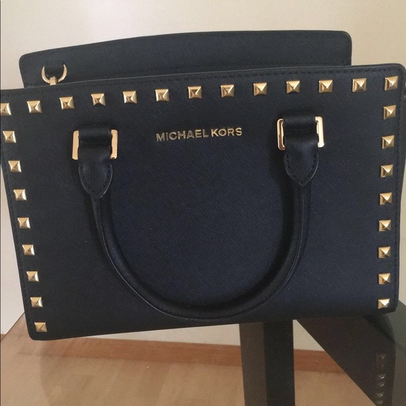 The iconic MK symbol was almost nonexistent! Before  Micheal kors
