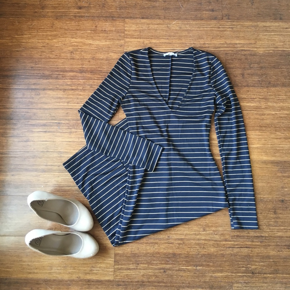 Long sleeved midi dress.