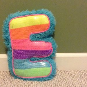 "E" pillow