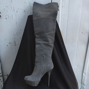 Gray thigh high Steve Madden leather boots.