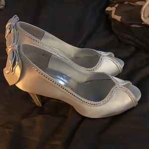 Beautiful white satin pumps.