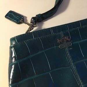 Teal coach wristlet