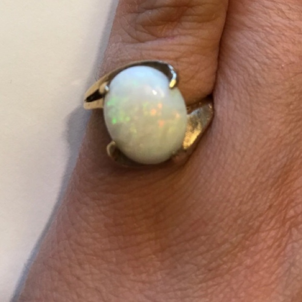 Big bold opal set in yellow gold ring