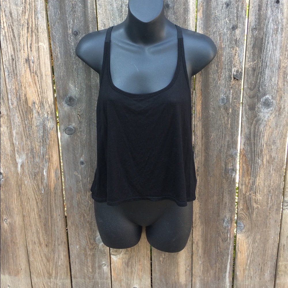 Black crop top with open back and ruffles