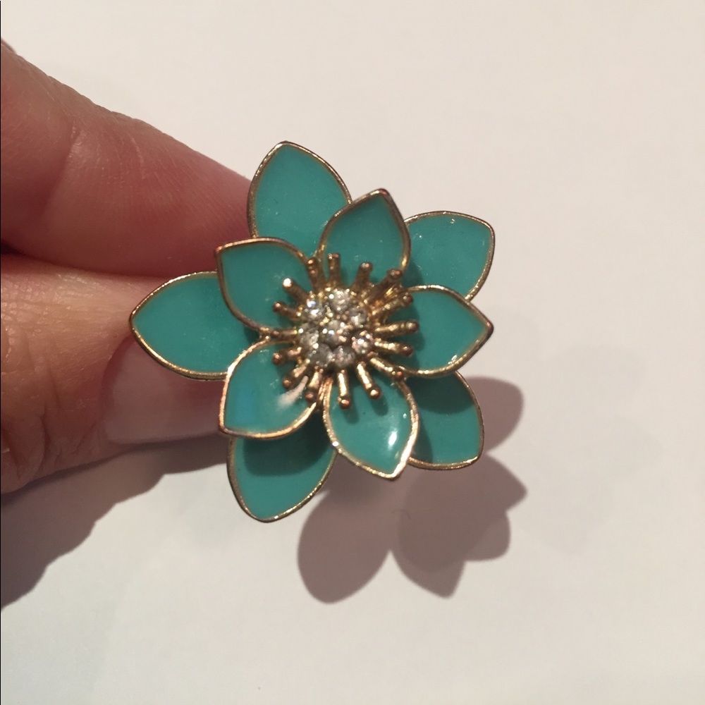 Teal flower statement ring.