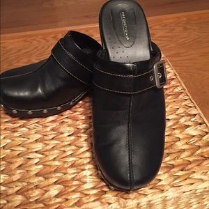 Black clogs with silver studs