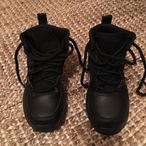 Boys black nike boots
