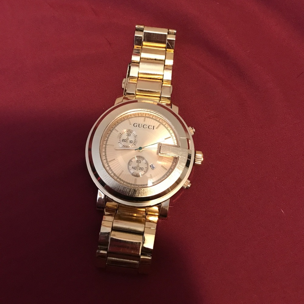 Gold Gucci Watch