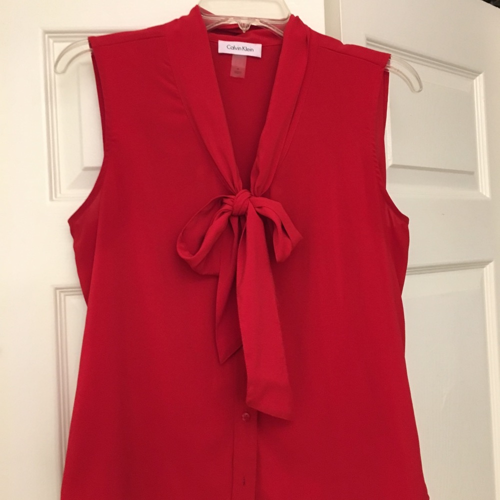 Classy Calvin Klein with bow at neck